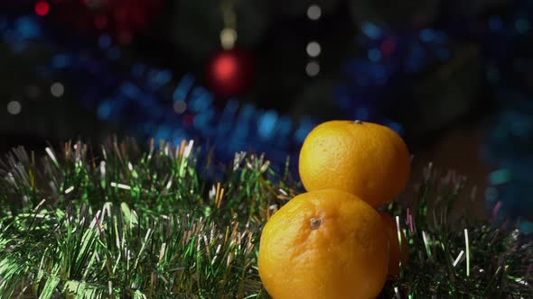 Woman's Hand With a Beautiful Manicure Takes a Tangerine