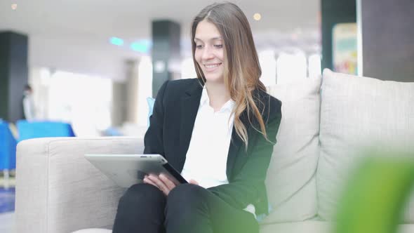 Woman using digital tablet