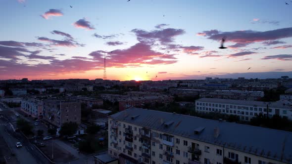 Pink Sunset Over a Small Town