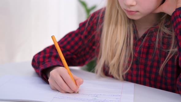 Blonde Schoolgirl Studying at Home Doing School Homework