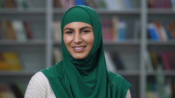 Pretty Arab Woman in Hijab Smiling at the Camera