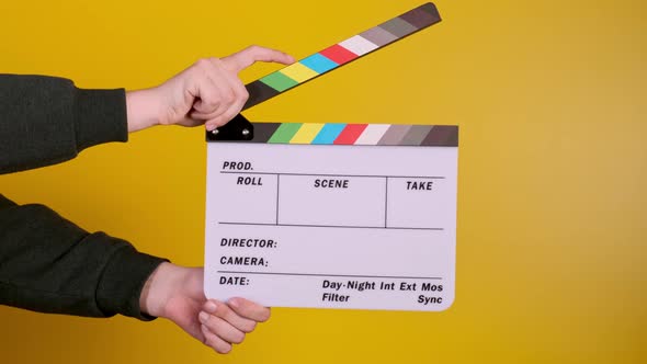 Male Hands Using Clapperboard Against Black Background Shooting Movies