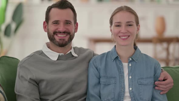 Happy Couple Smiling at the Camera Home