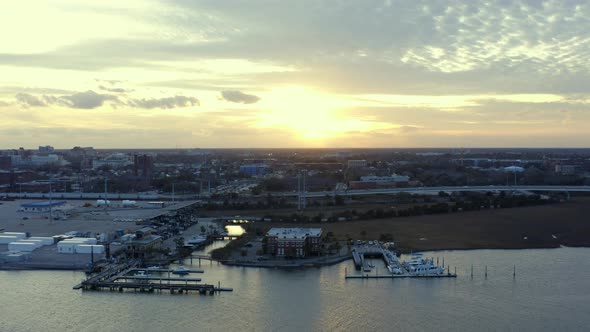 Flying toward downton Charleston at sunset