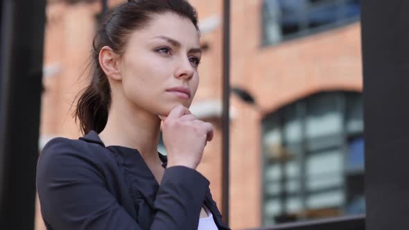 Thinking Business Woman Ouside Office