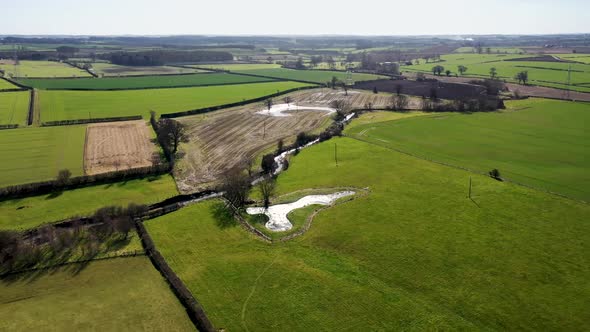 Aerial photo of the UK village of Wetherby in Yorkshire showing fields in the winter time