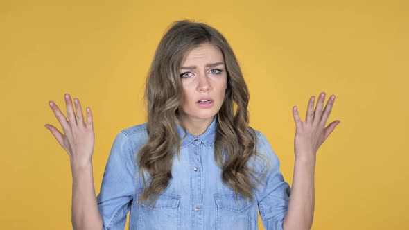 Young Girl with Frustration and Anger Isolated on Yellow Background