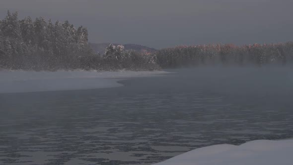 Winter River with Haze Over Cold Water