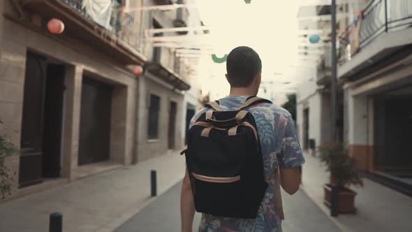 Man Enjoying Walk in a New City.