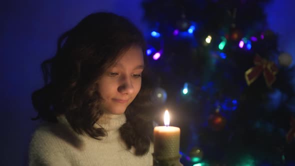 A Girl With A New Year's Candle