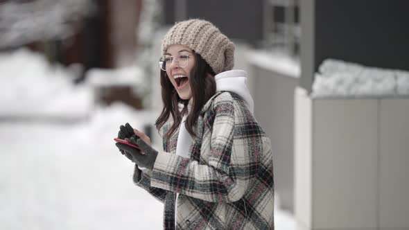 Happy Young Woman Is Smiling on Street at Winter Day Portrait of Laughing Lady