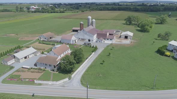 Aerial View of Amish Church Meeting with Horse and Buggies on a Sunny Summer Day