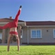 Athlete Performs Gymnastics Movement Turning Her Body Toward the Ground - VideoHive Item for Sale