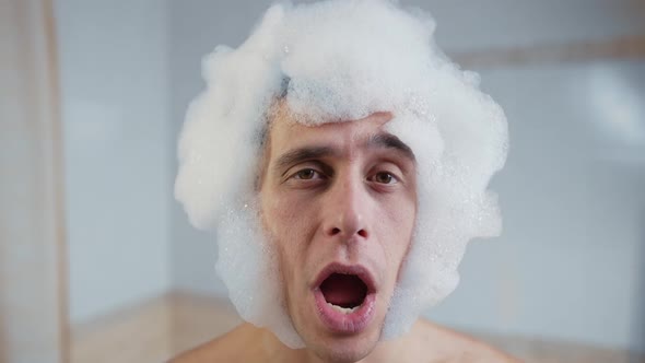 A Man in a Foam Wig Singing