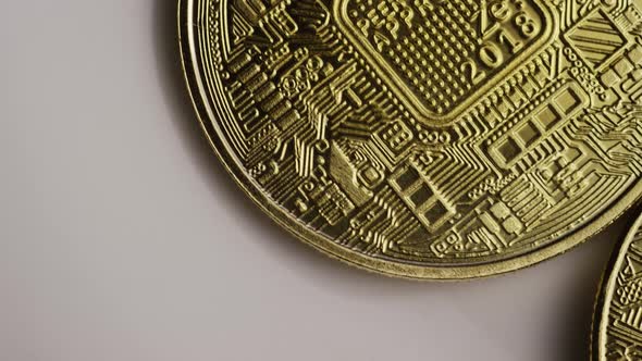 Rotating shot of Bitcoins (digital cryptocurrency) - BITCOIN 0343