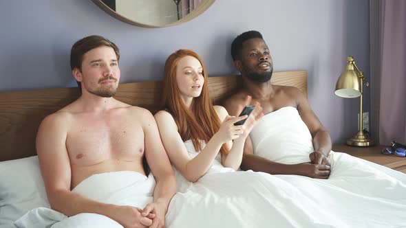 Diverse Trio Watches TV in the Bedroom.
