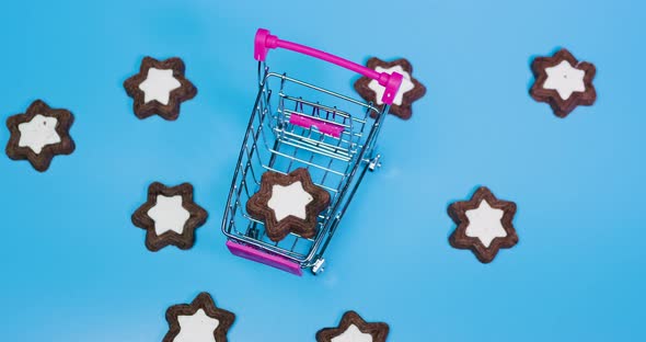 Stop Motion Animation Of Cookies Made Of Stars, Food In The Form Of Baked Goods In A Trolley