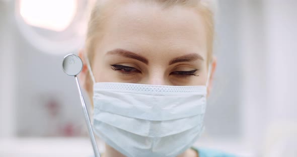 Positive Female Dentist in Healthcare Clinic alt