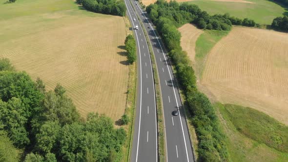 german autobahn from above through landscape