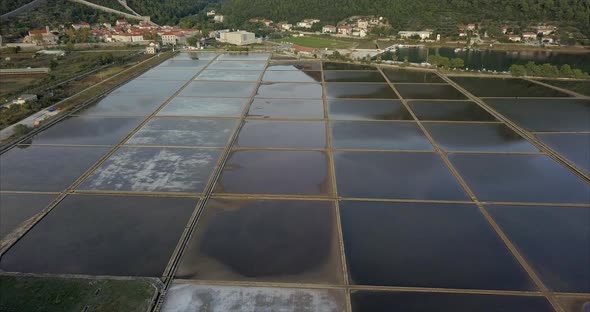 Wide angle view of the salt pans in Ston, Croatia. the camera follows the salt pans to the Fort of S