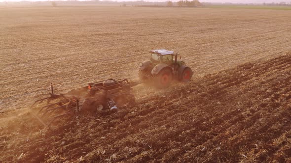 Agricultural Tractor Is Working in the Field