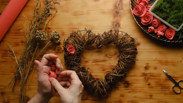 Hands Decorating Valentines Day DIY Floral Wreath