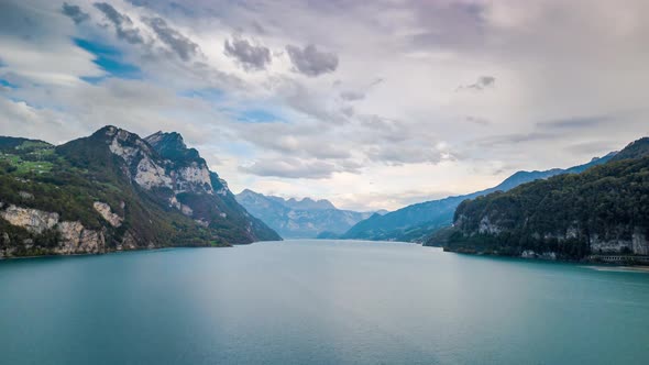 Hyperlapse shot from the Lake of Walen in Switzerland. In the backgrounds areing some sailboats.