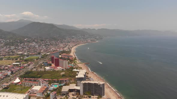 Aerial drone footage of the beautiful beach and coastal area of Puerto Vallarta in Mexico