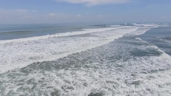 Bali aerial endless waves chasing each other