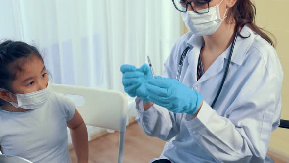 School Girl Visits Skillful Doctor at Hospital for Vaccination