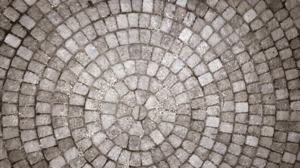 Concrete Old Dominion Paver Circle. Aerial shot looking down at circular brick pathway and seating a