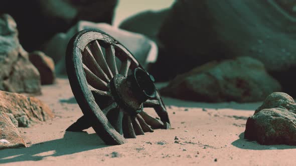 Old Wooden Cart Wheel at Sand Beach