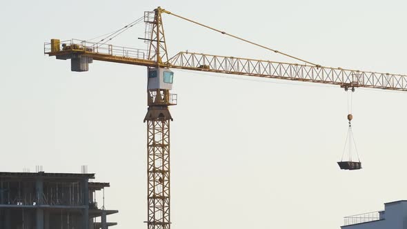 Aerial View of Tower Cranes and High Residential Apartment Buildings Under Construction