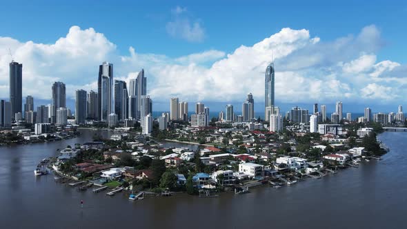 Unique aerial view of popular real estate canal property close to the towering Gold Coast Australia