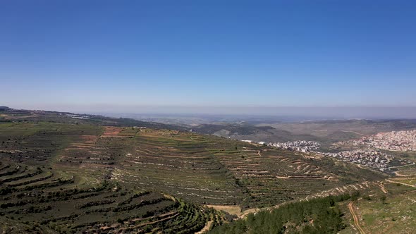 Aerial view of the Jerusalem area terrace green hills, Shot with a drone.