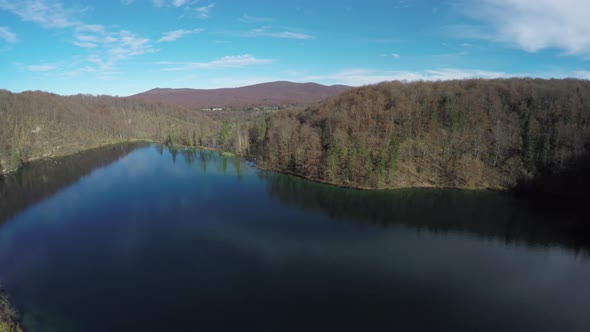 Aerial of a lake surrounded by hills, Plitvice Park