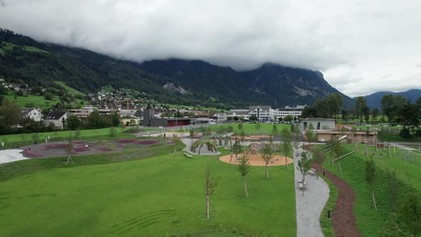 Playground for Children in Liechtenstein Among the Mountain Valley Aerial Vew