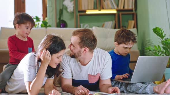 In Living Room Charismatic Mom and Dad and Cute