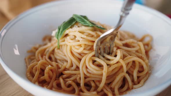 Woman Eating Pasta With Sauce Bolognese