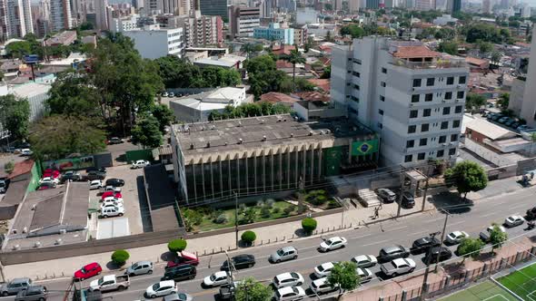 Aerial point of interest shot around a street of Goiania in Brazil with a traffic jam.