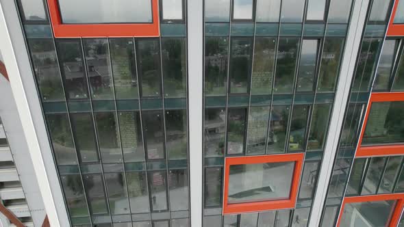 Aerial View of the Exterior of a Modern Hotel Building with Large Windows