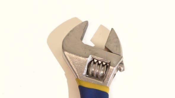 Adjustable Wrench on White, Rotation, Close Up