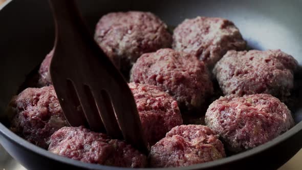 Frying Meatballs Cutlets in Oil On a Frying Pan Unhealthy Food Slow Motion Video