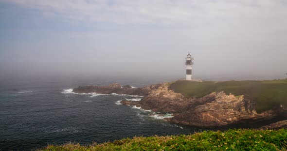 Timelapse of Misty Day at Ribadeo Lighthouse, Galicia, Spain